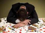Businessman at Card Table